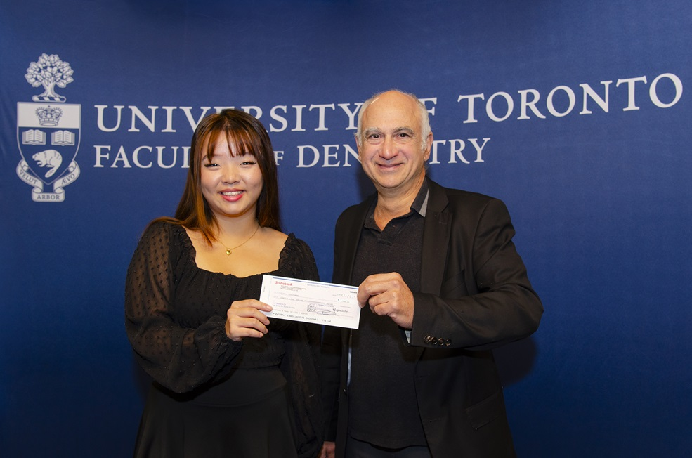Cheque presentation to Yifei Wang, presented to her by Dr Morris Manolson, Vice-Dean (Research) at the Dean’s Appreciation event